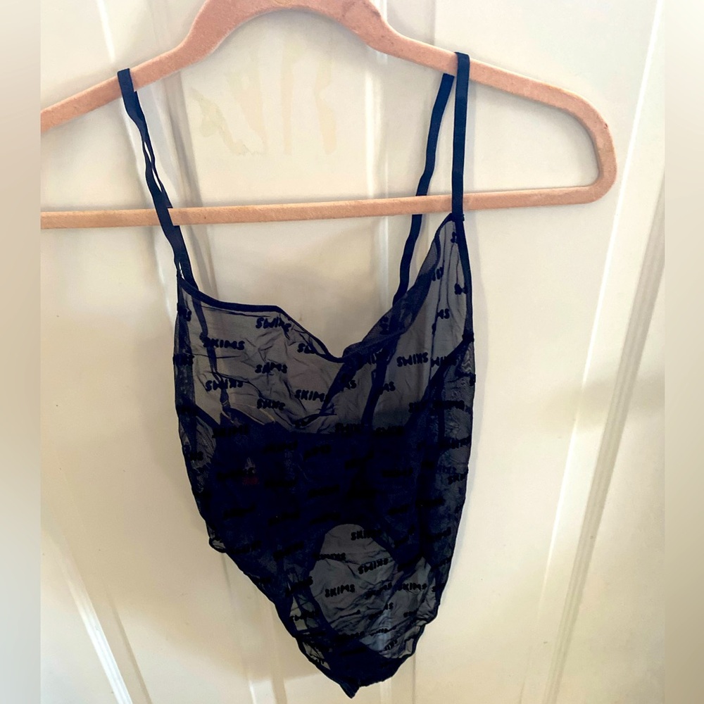 Skims Thong See Thru Bodysuit. NWT.
Size XL